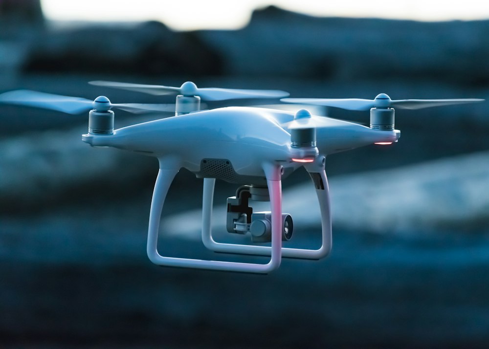 Multispectral drone hovering over agricultural land